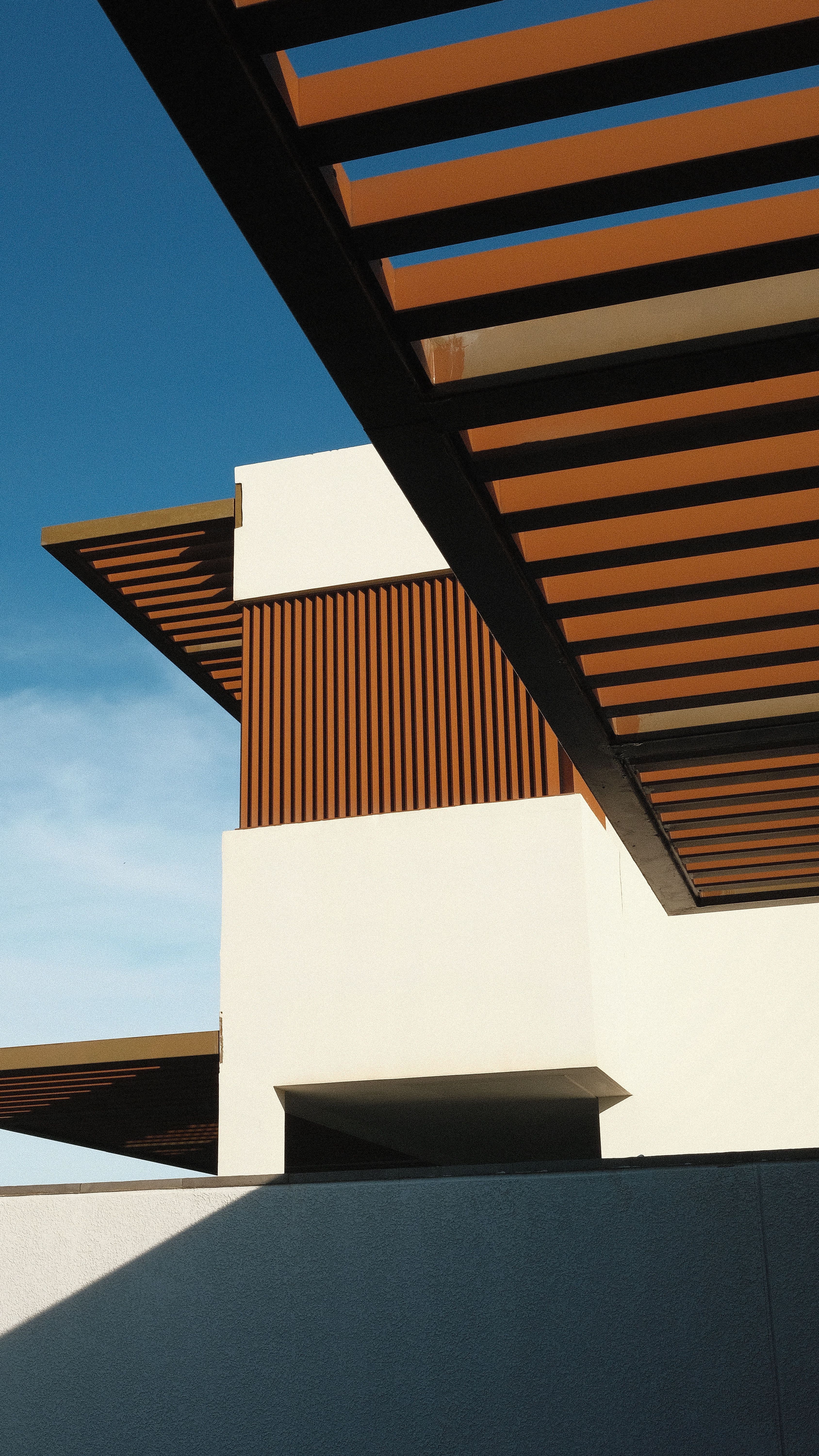 Rendered exterior wall protected with OHY coating